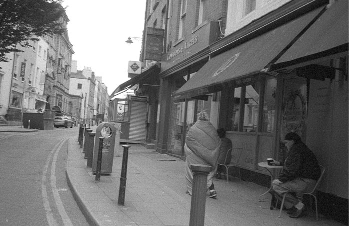 Fig. 12 A lone diner on South William Street, March 2020. Personally, I stopped eating out or even buying a cup a coffee in March 2020. Instead I prepared all my food and drinks at home. I began eating out again in June 2022.