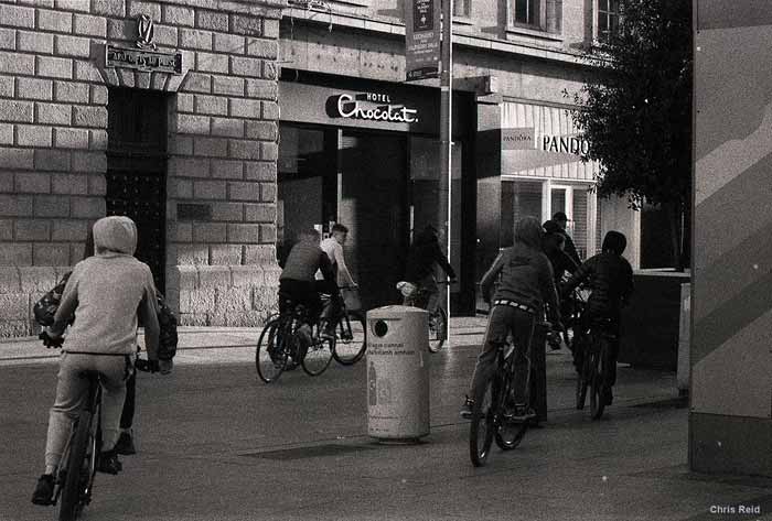 Fig. 23 Large gangs of children take to cycling wildly around the city.