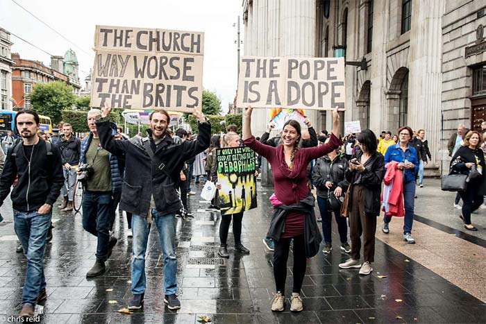 Fig.3 A couple outside the General Post Office (G.P.O) holding up placards with thought provoking and playful statements.